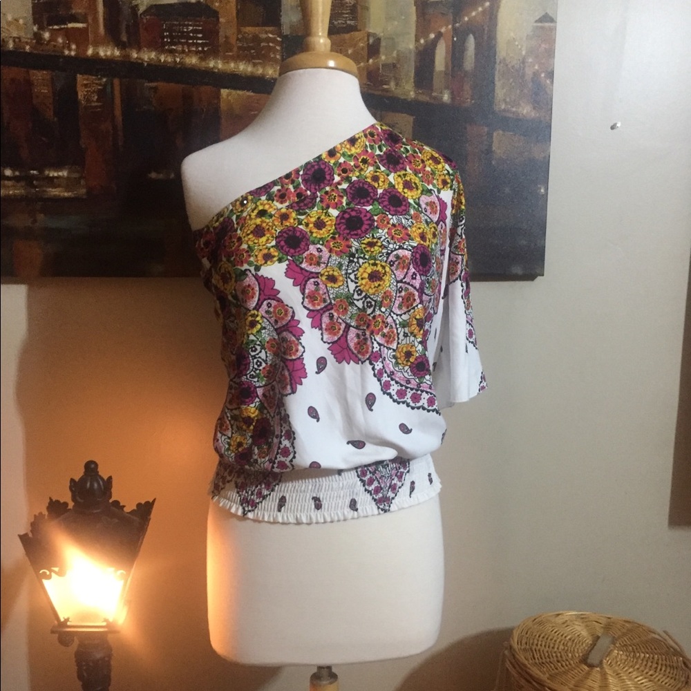 One shoulder top with sparkle details on chest.